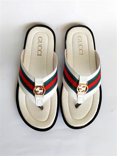 white gucci slippers men